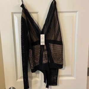 Black and nude lace pattern long sleeve deep V bodysuit